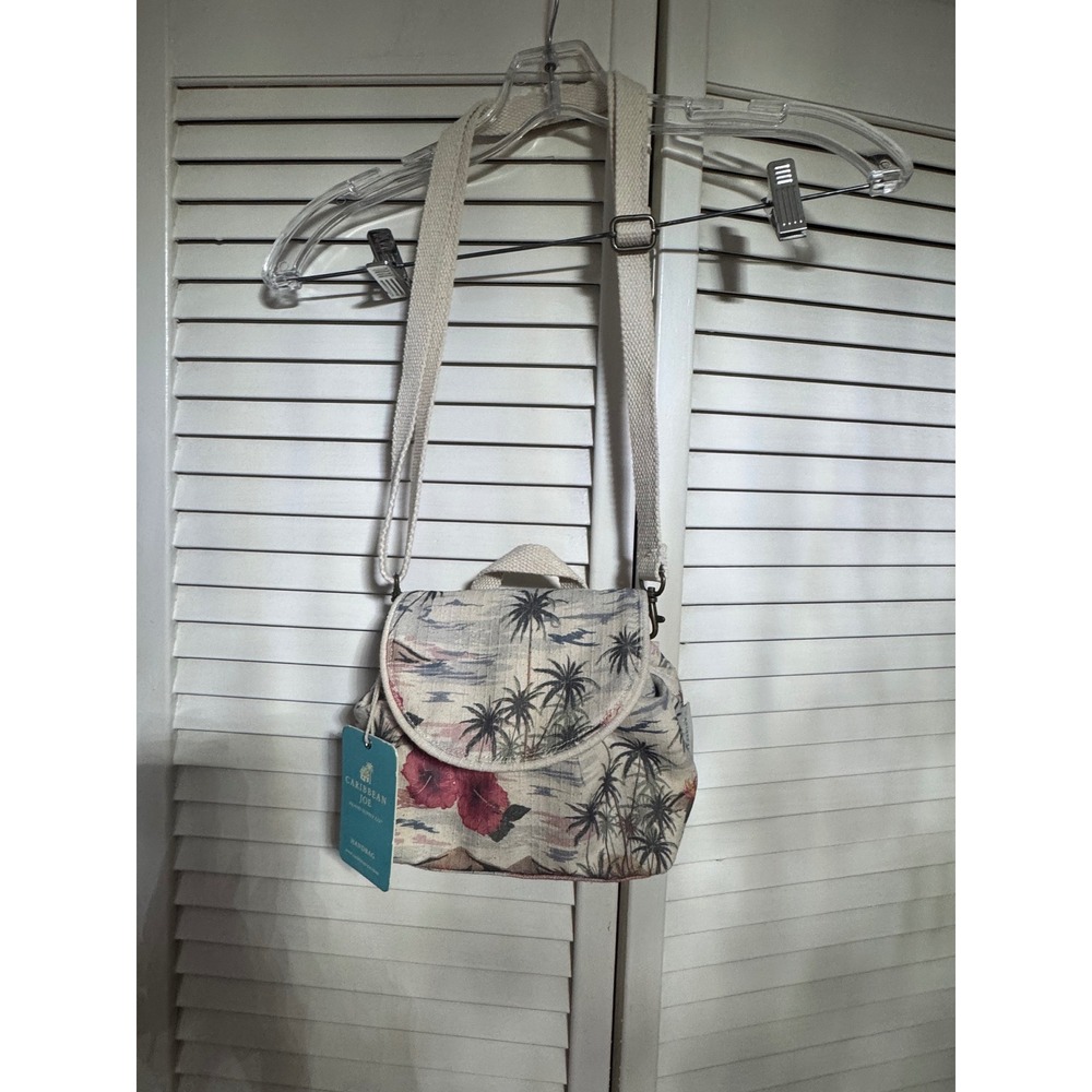 Caribbean Joe Cream Crossbody Bag with Blue Palm Print and Red Floral Accents